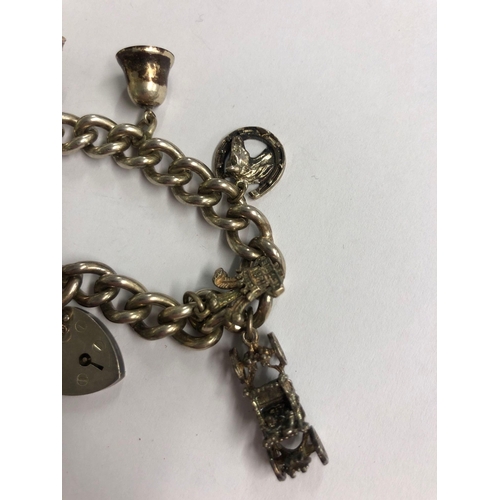 869 - SILVER CHARM BRACELET, 48g