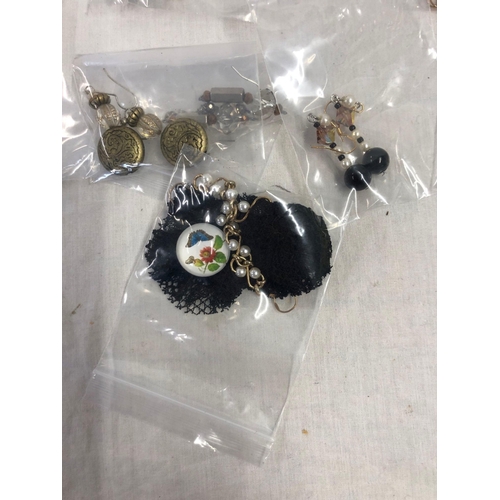 881 - TUB OF DESIGNER EARRINGS (12)