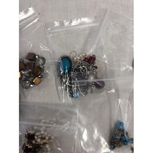 881 - TUB OF DESIGNER EARRINGS (12)