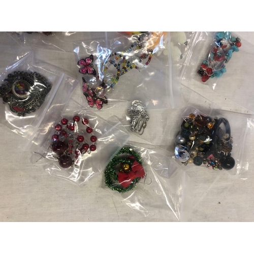 891 - TUB OF DESIGNER EARRINGS (12)