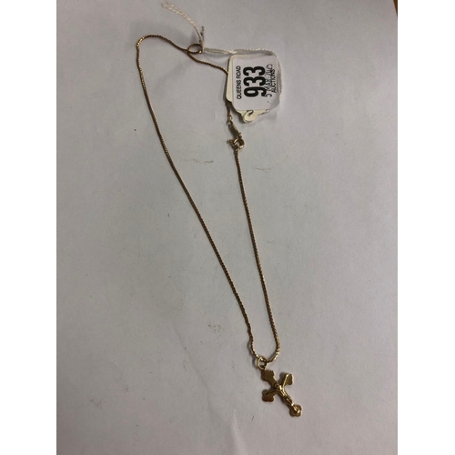 933 - A 9ct GOLD CRUCIFIX  ON A GOLD NECK CHAIN