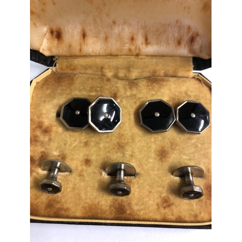 938 - A BOXED PAIR OF SILVER ONYX & PEARL STUDS + 3 MATCHING STUDS