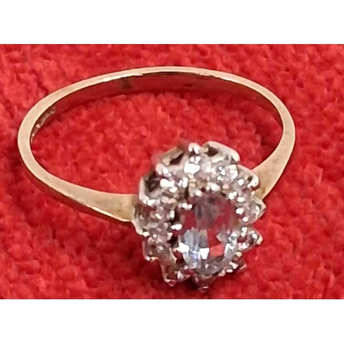 A 9ct TOPAZ CLUSTER RING