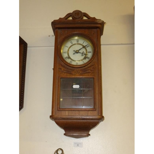 41 - Vintage oak cased pendulum wall clock