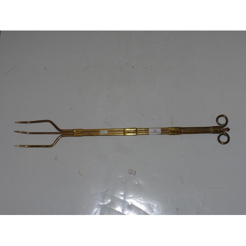 102 - Vintage brass toasting fork