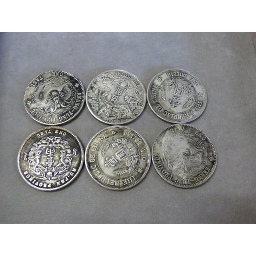 305 - Six Kiang Nan silver dollars (178 grams)