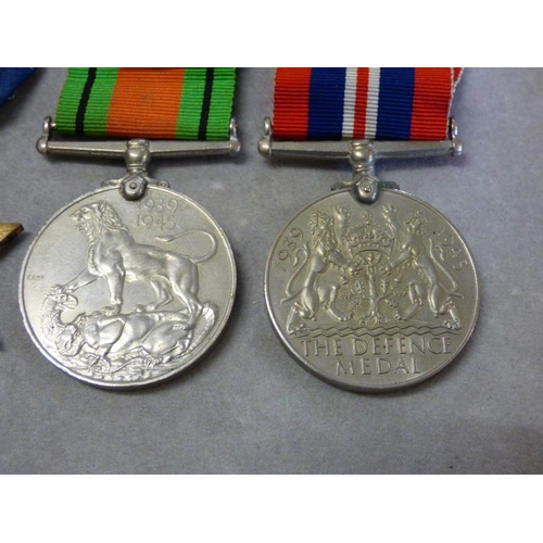 313 - Four George VI period medals including service stars