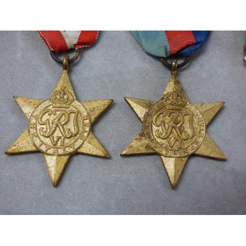 313 - Four George VI period medals including service stars