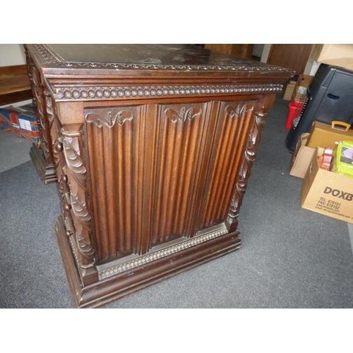 349 - Carved oak antique desk with twin pedestal and modesty panel