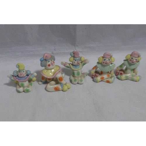 105 - Five miniature Ceramic Clowns