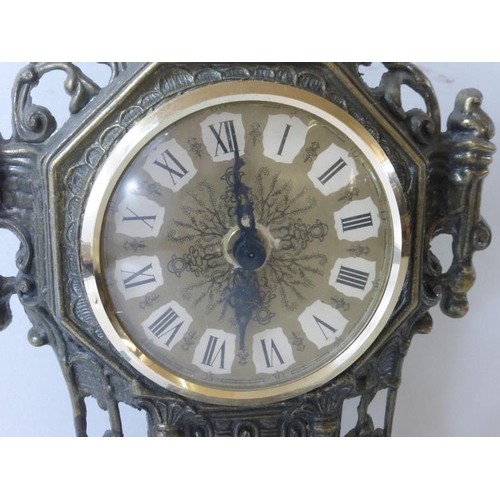 84 - Ornate cast Brass Clock