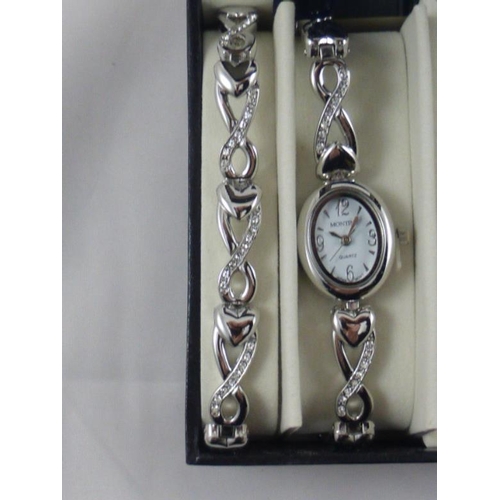 93 - Stunning Montine Bracelet, Watch, Necklace and Earrings all set with White Crystals and Supplied in ... 