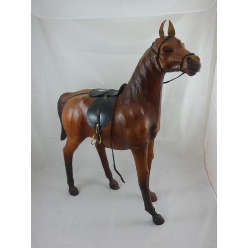 111 - Large Leather Horse with saddle and stirrups , 29 inches tall