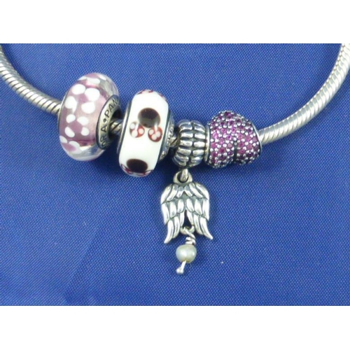 34 - Genuine Pandora Bracelet with Four Charms Including Disney comes complete with Original Box