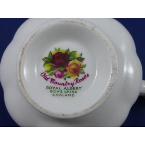 81 - Royal Albert Country Roses 1962 Teapot with Six cups and Saucers