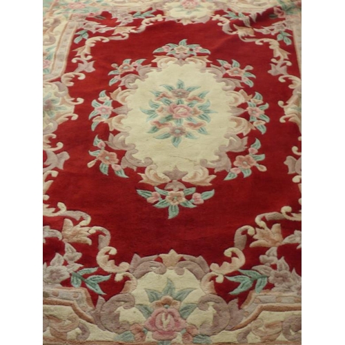 658 - Large Red floral rug approx. 9 x 6ft