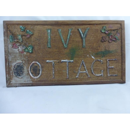 255 - A vintage hardwood Ivy Cottage home name plaque. Approx 18 inches by 10 inches.