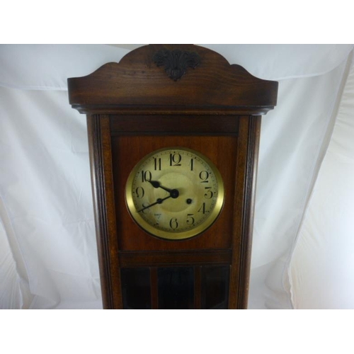 268 - American Ansonia Wall clock complete with pendulum and key