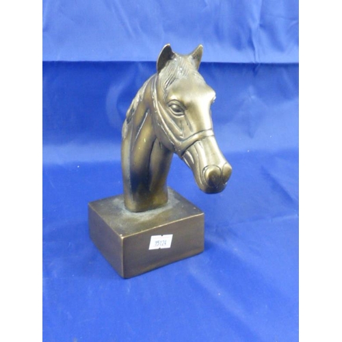 214 - Bronze horse head on plinth