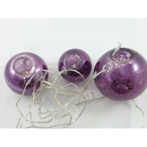 621 - A Set of purple mirror balls with white lights. boxed.