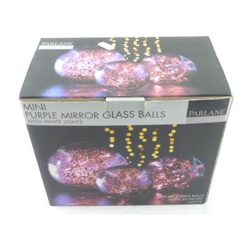 621 - A Set of purple mirror balls with white lights. boxed.