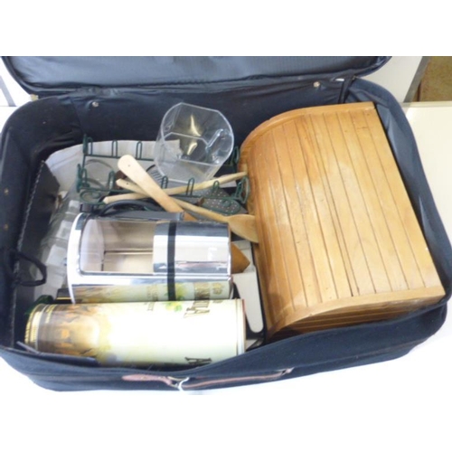 636 - Suitcase complete with contents to includes ice cube crusher, bread bin and other