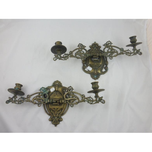 643 - Pair of vintage brass wall mountable candle holders