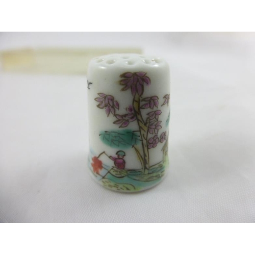 5 - A Boxed set of 10 oriental themed thimbles