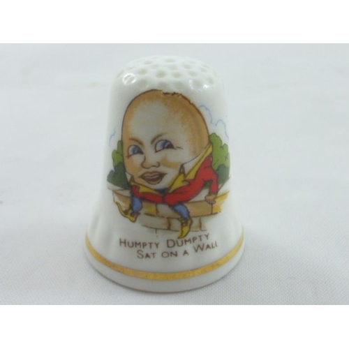 68 - A collection of 12 Nursery Rhyme Thimbles