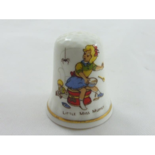 68 - A collection of 12 Nursery Rhyme Thimbles