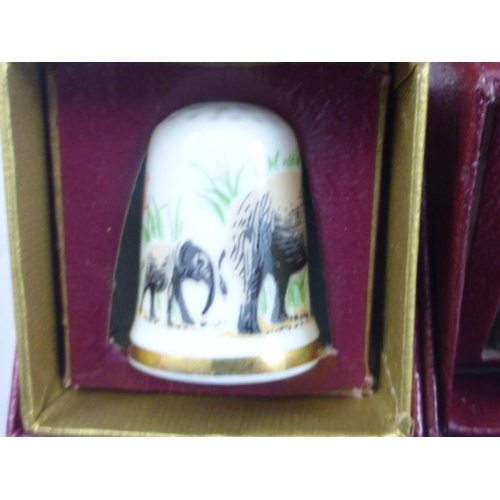 72 - Six individually boxed Caverswall collectors animal thimbles including the Giant Panda