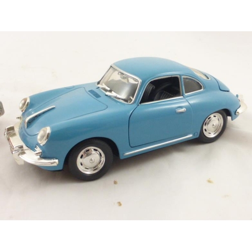 93 - Two 1-24 Scale Models including Burago Jaguar XK120 and Porsche