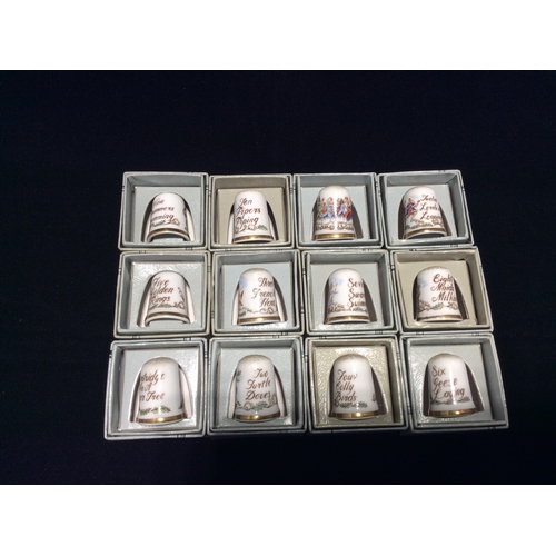 137 - Complete set of Caverswall china Thimbles featuring the twelve days of Christmas. Each individually ... 