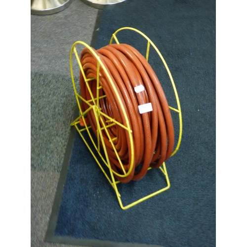 654 - Hose pipe on reel