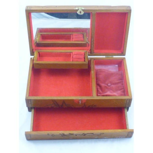 662 - Wooden hand carved jewelry box, nicely lined lined inside with mirror