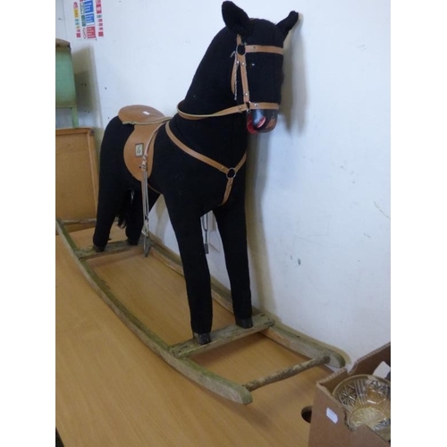 433 - Mamas and Papas Large Rocking Horse Wooden base. Faux leather saddle. 102cm tall