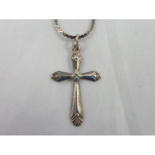 62 - Silver cross and chain