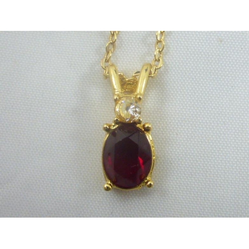 97 - Two Necklaces Including Vintage Multi Coloured Glass Stoned and Gold Tone with Ruby Red Stone