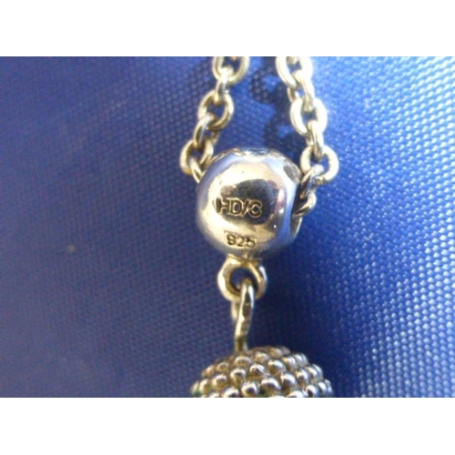 64 - Silver 925 ball pendant on chain marked 925