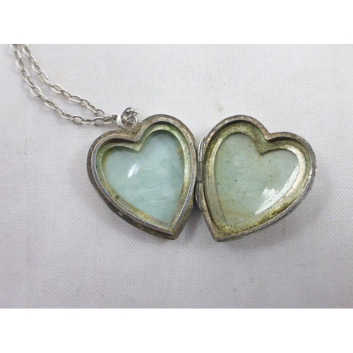 49 - Vintage Silver Heart Shaped Locket complete with Silver Chain