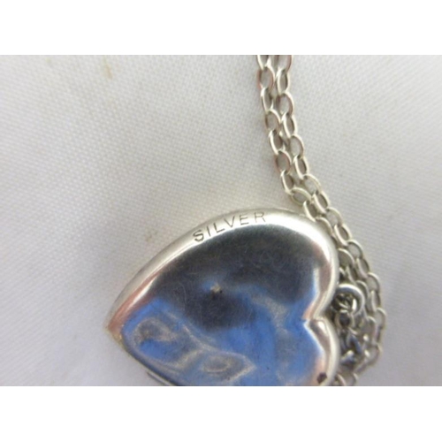 49 - Vintage Silver Heart Shaped Locket complete with Silver Chain