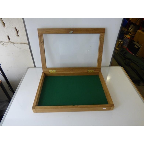 182 - Lockable display case with key approx. 26