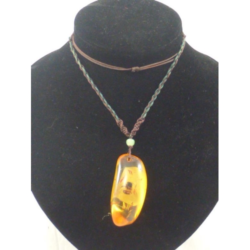 8 - Large Amber Pendant on Twisted String Chain