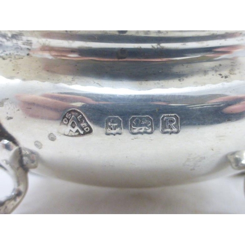 39 - Two Birmingham Hallmarked Silver Glass Lined Condiment Pots complete with Spoons (A/F) (85 grams)