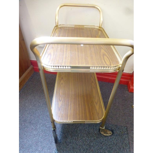 445 - Metal wheel along tea trolley