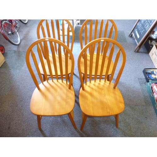 574 - Four wooden kitchen chairs