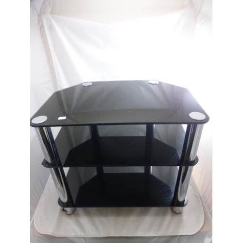 664 - Three tier glass tv stand measuring 60cm x 41cm