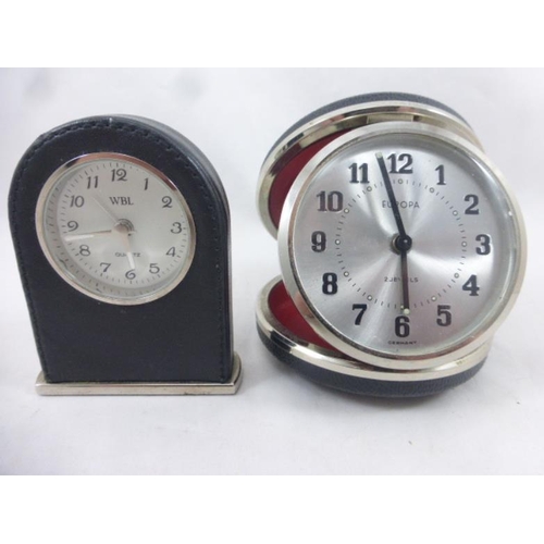 22 - Two Travel Clocks Including Europa and WBL