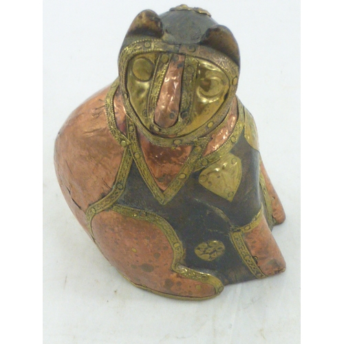 10 - Hand carved cat figure decorated with brass and copper