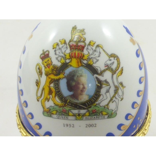 119 - Three commemorative porcelain eggs